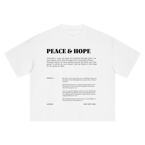 A white short-sleeve t-shirt with black printed text on the front, featuring the title 'PEACE & HOPE' and a block quote with biblical references and scripture verses.