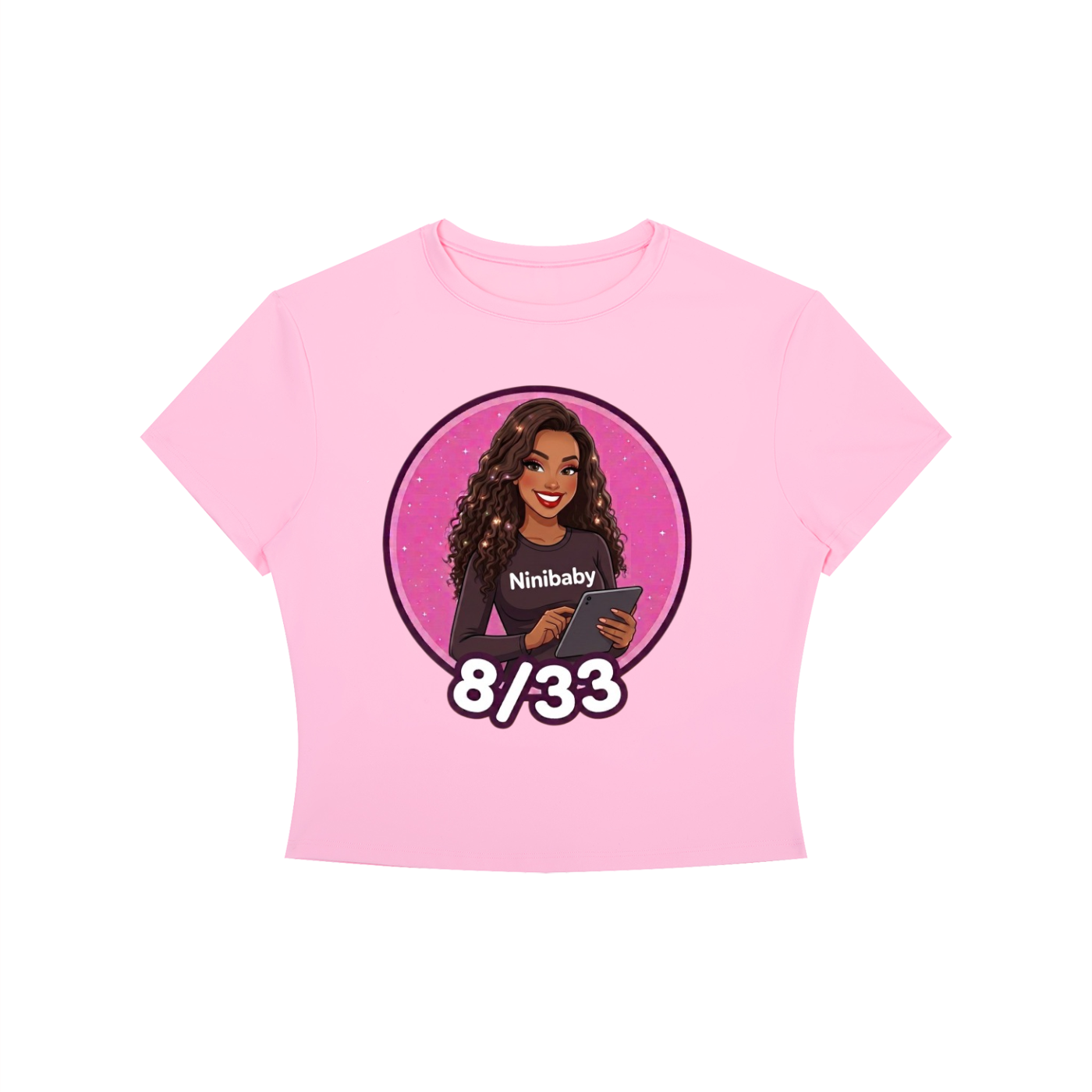 A light pink short-sleeve crop top t-shirt featuring a circular graphic print of a woman with the text 'Ninibaby' and '8/33' below it, displayed on a solid white background.
