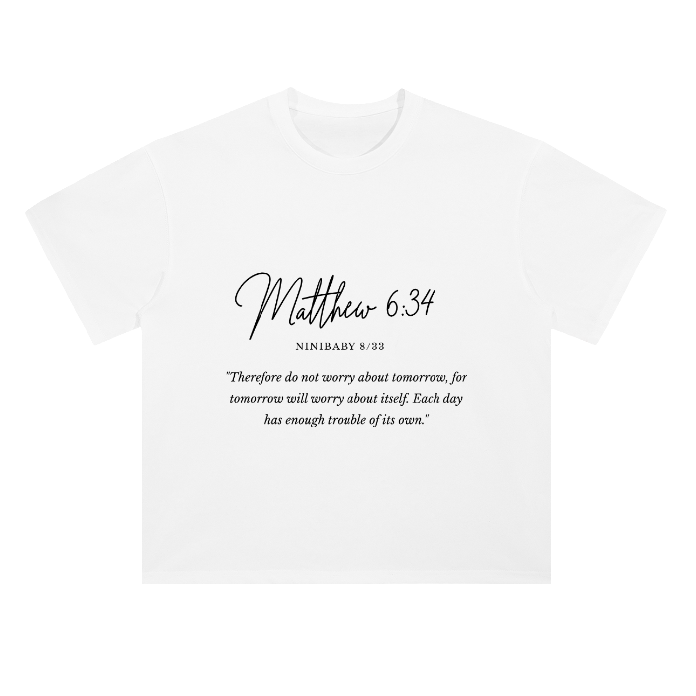 A white short-sleeve crewneck t-shirt with black printed text on the front reading 'Matthew 6:34' and a Bible verse from NINIBABY 8:33, displayed on a clean white background.