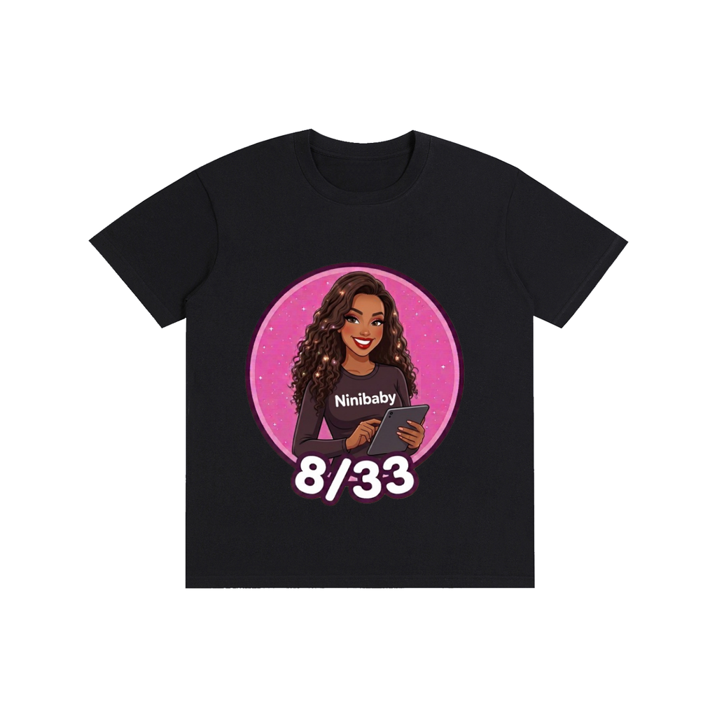 A black short-sleeve crewneck t-shirt featuring a circular graphic print of a cartoon woman with the text 'Ninibaby' and '8/33' on a white background.