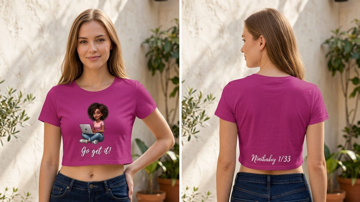 A side-by-side front and back view of a woman wearing a bright magenta crop top with a graphic of a woman working on a laptop and the text 'Go get it!' on the front, paired with dark blue jeans in an outdoor patio setting with potted plants.