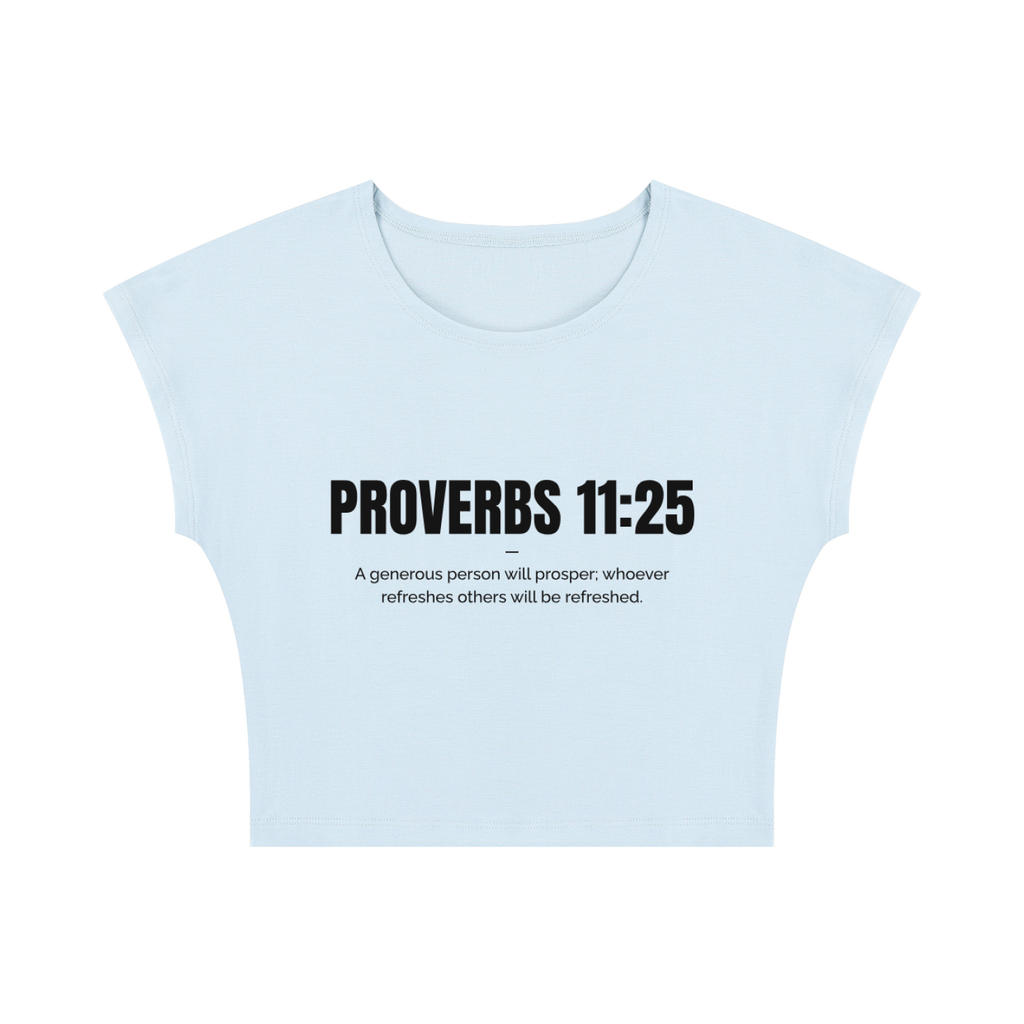 A light blue cropped t-shirt with black text on the front reading 'PROVERBS 11:25' and a smaller quote underneath, displayed on a solid white background.