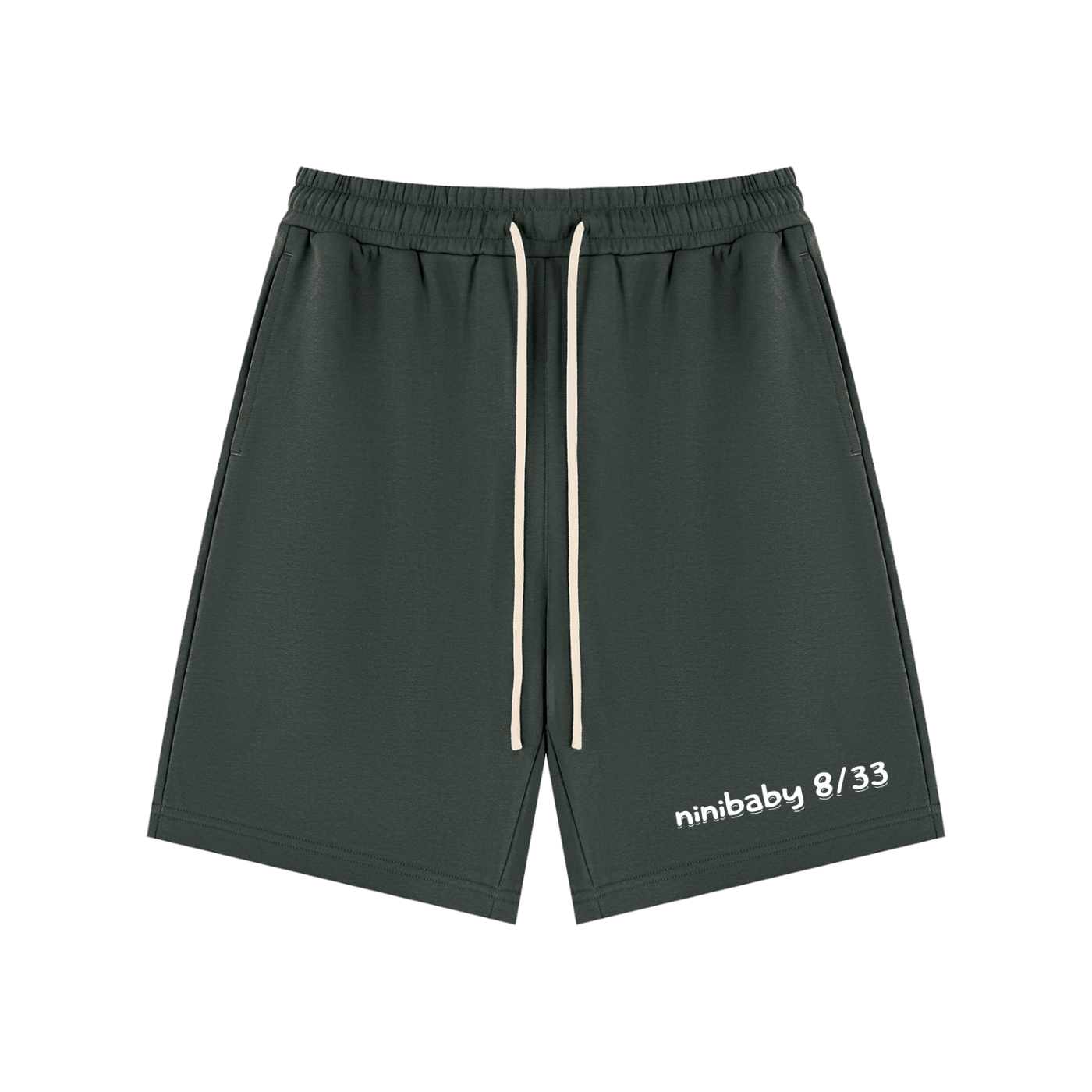 Green athletic shorts with a brand logo on a light gray background