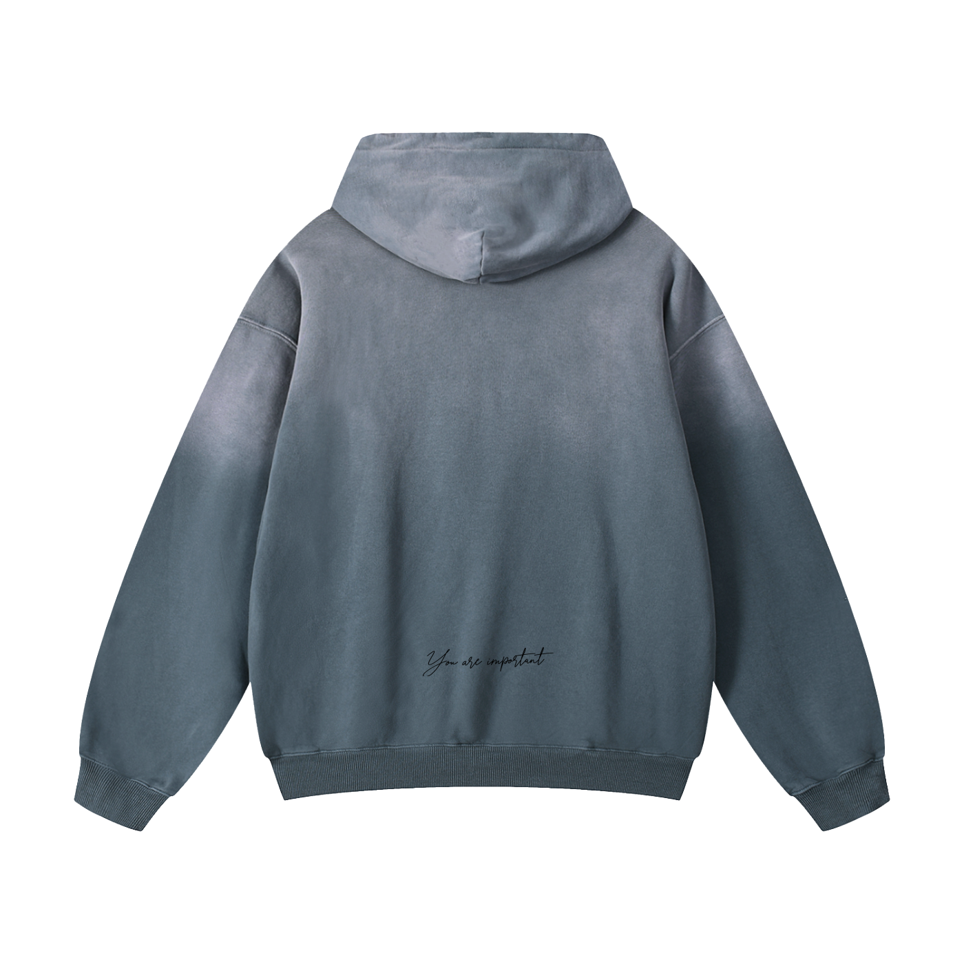 A slate blue-gray hooded sweatshirt shown from the back, featuring a subtle gradient fade from a darker blue-gray at the shoulders to a lighter gray at the sleeves and hood. A small black script logo is printed near the lower back, set against a plain white background.