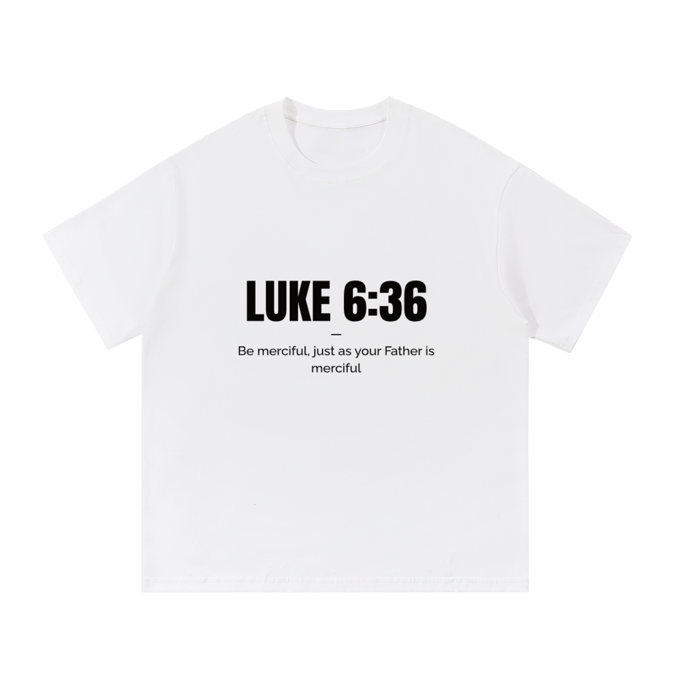 A white short-sleeve crewneck t-shirt with black printed text on the chest reading 'LUKE 6:36' and 'Be merciful, just as your Father is merciful'.