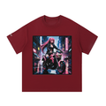 A maroon short-sleeve crewneck t-shirt featuring a large square graphic print on the front of a futuristic anime-style woman with pink hair riding a pink motorcycle in a neon-lit city at night.