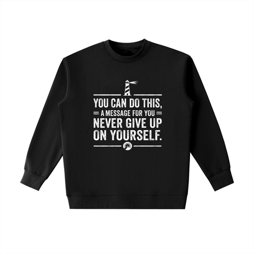 A black crewneck sweatshirt with a white graphic print on the front featuring a lighthouse and motivational text, displayed on a solid white background.